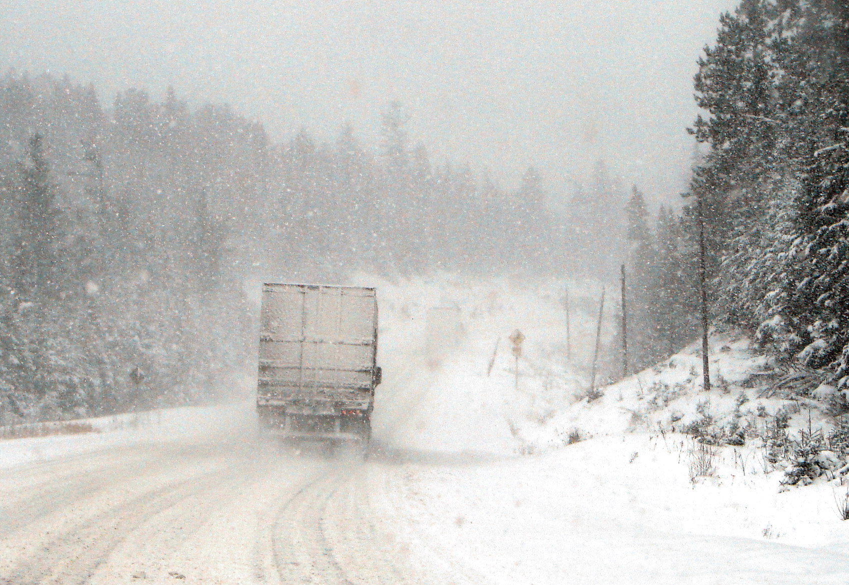 Semi-truck driving in the winter